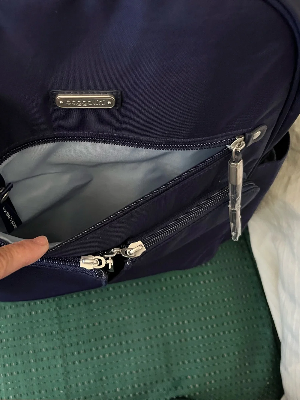 Baggallini Backpack- NWT Color: Navy Blue